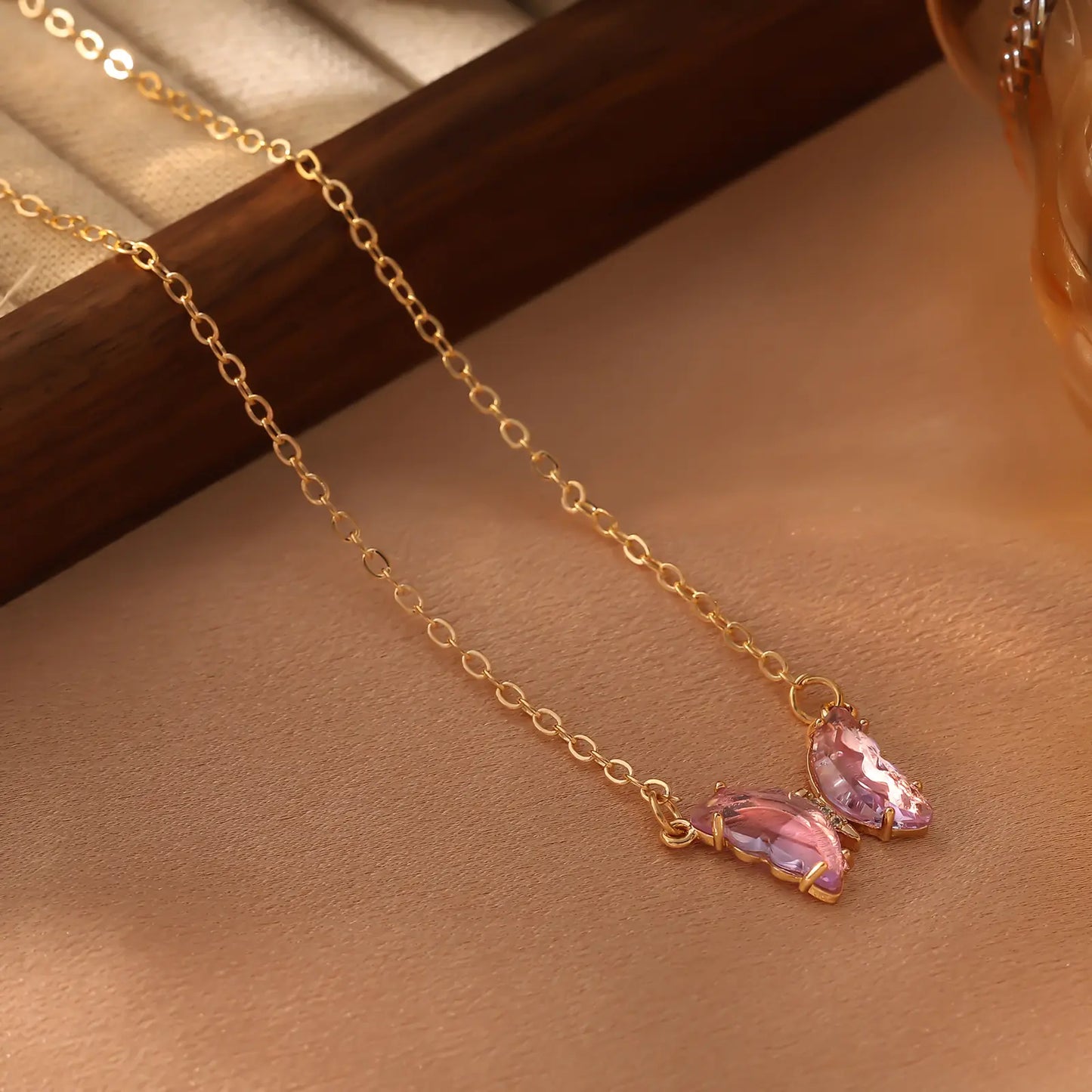 Iridescent Glass Butterfly Necklace, Pink color option.