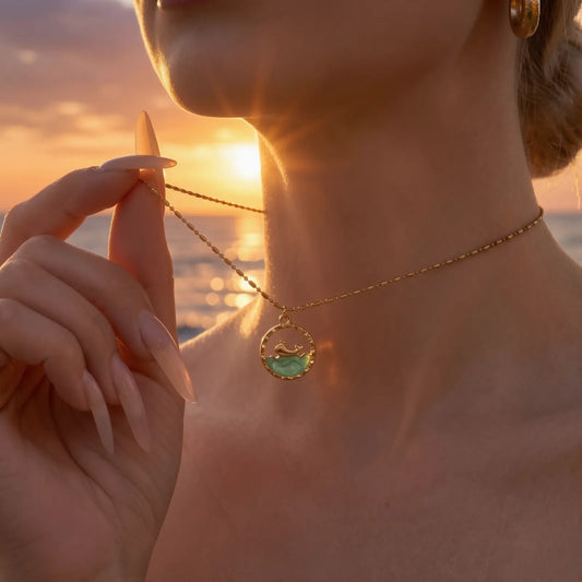 Ocean Motif Glass Pendant Necklace worn at the neckline, lifestyle view alternate.