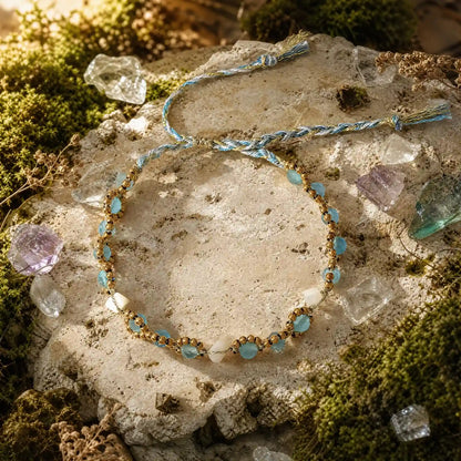Natural cat's-eye braided bracelet on a mineral surface