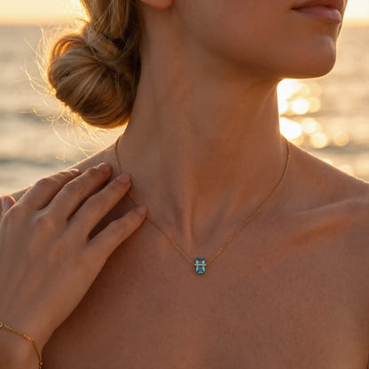 Diamond Birthstone Pendant Necklace worn at the neckline, lifestyle view 4.