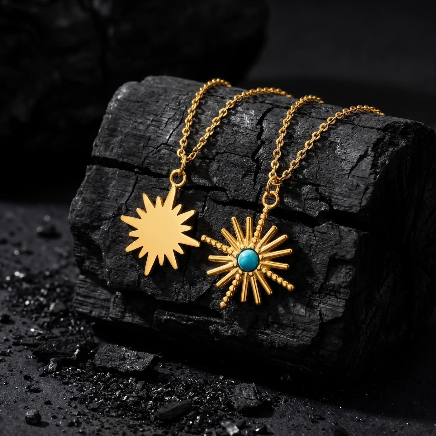 Two vintage natural turquoise pendant necklace styles displayed on black stone