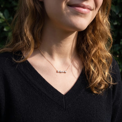 White Crystal Constellation Bar Necklace worn at the neckline, lifestyle view 1.
