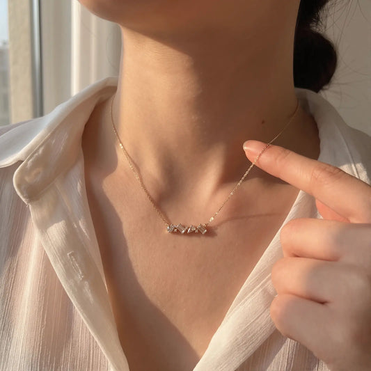 White Crystal Constellation Bar Necklace worn at the neckline, lifestyle view 3.