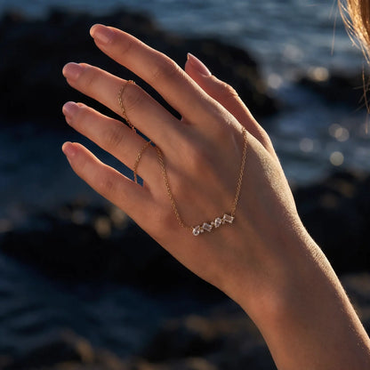 White Crystal Constellation Bar Necklace worn at the neckline, lifestyle view 5.