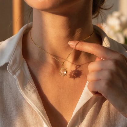 Sunray White Crystal Pendant Necklace worn at the neckline, lifestyle view 5.