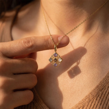 Filigree Window Mixed-Stone Pendant Necklace worn at the neckline, lifestyle view 9.