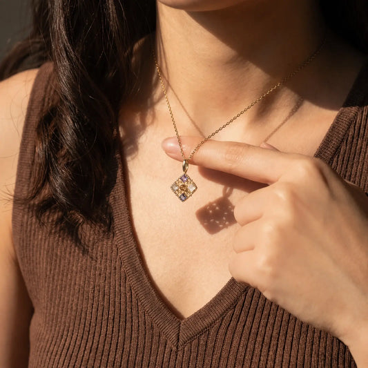 Filigree Window Mixed-Stone Pendant Necklace worn at the neckline, lifestyle view 6.