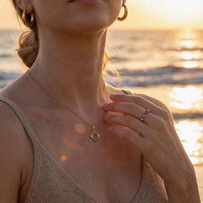 Filigree Window Mixed-Stone Pendant Necklace worn at the neckline, lifestyle view 8.