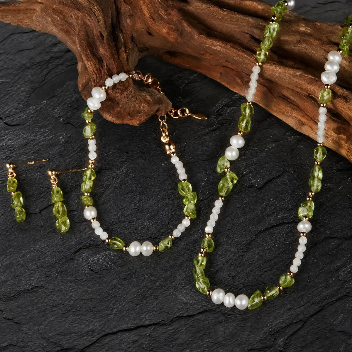 Coordinated peridot necklace bracelet and drop earrings with pearl accents