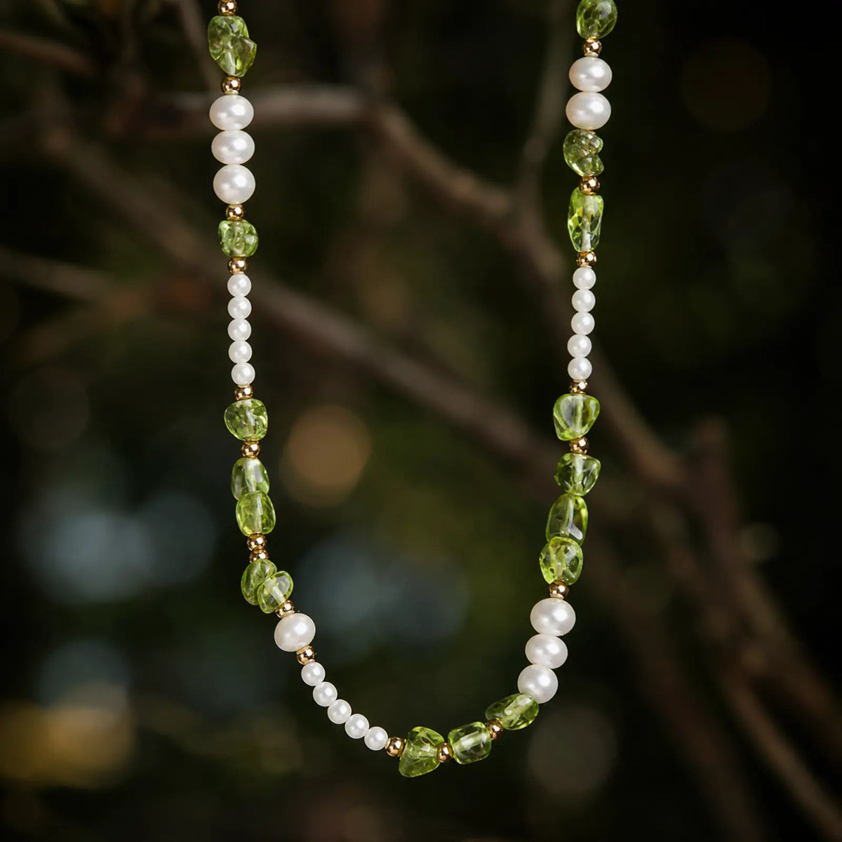 Peridot chip necklace with freshwater pearls and white shell beads
