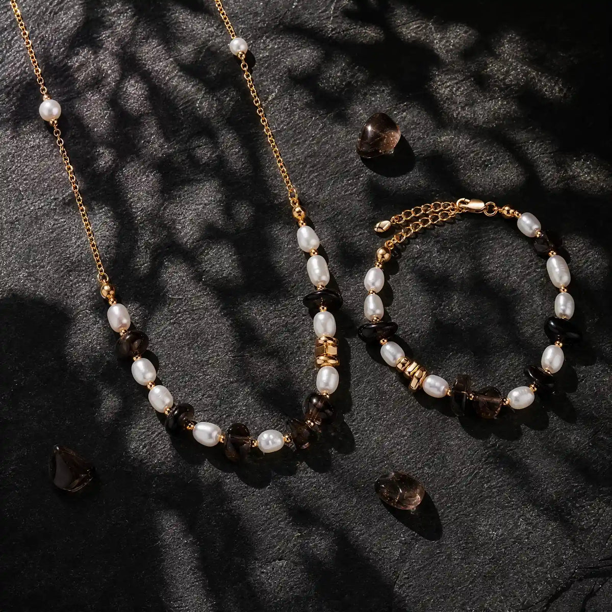 Matching smoky quartz and freshwater pearl necklace and bracelet set