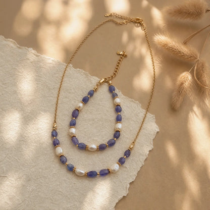 Tanzanite and freshwater pearl necklace and bracelet displayed together