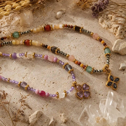 Natural stone clover necklaces with contrasting bead compositions