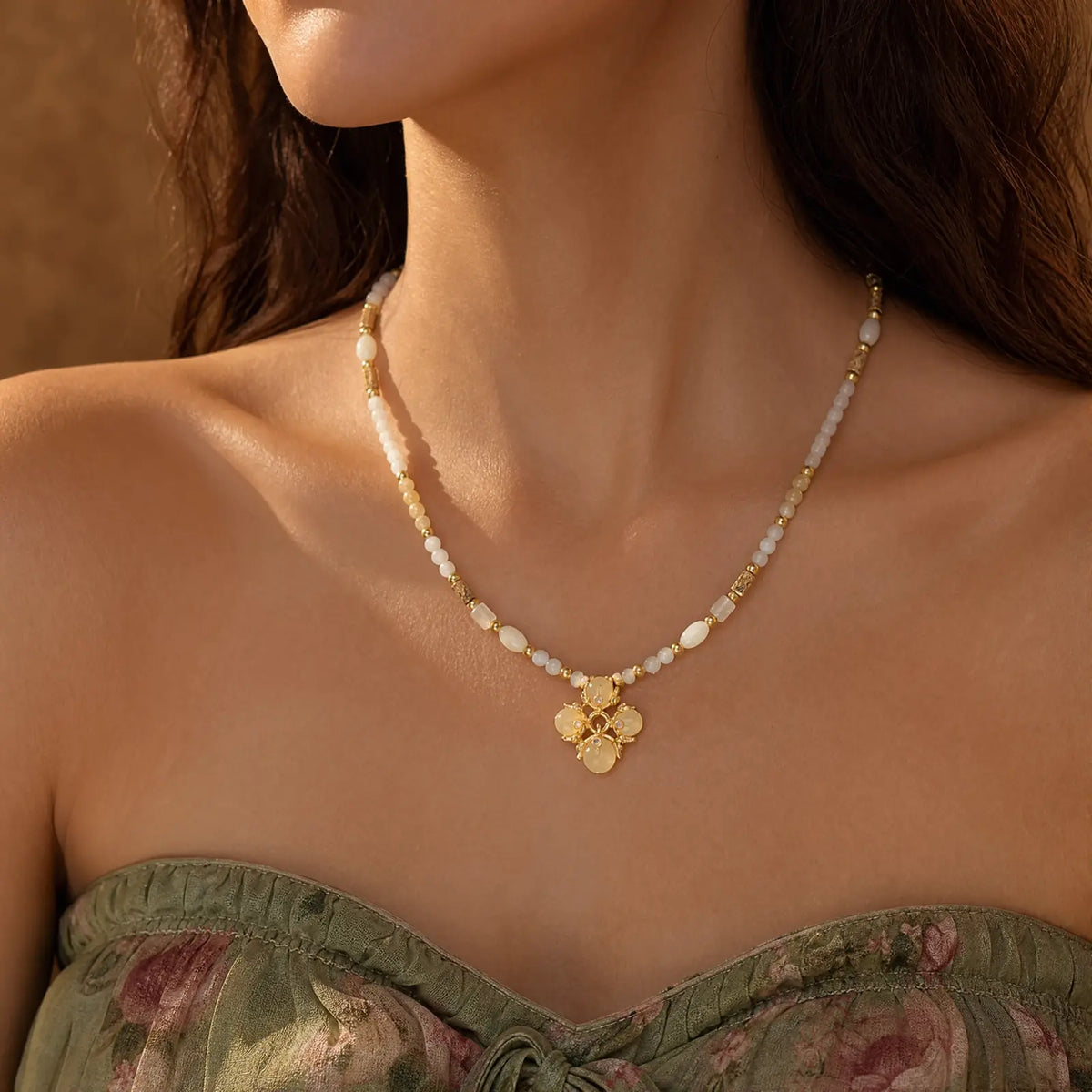 Opal cluster necklace styled with a green floral dress