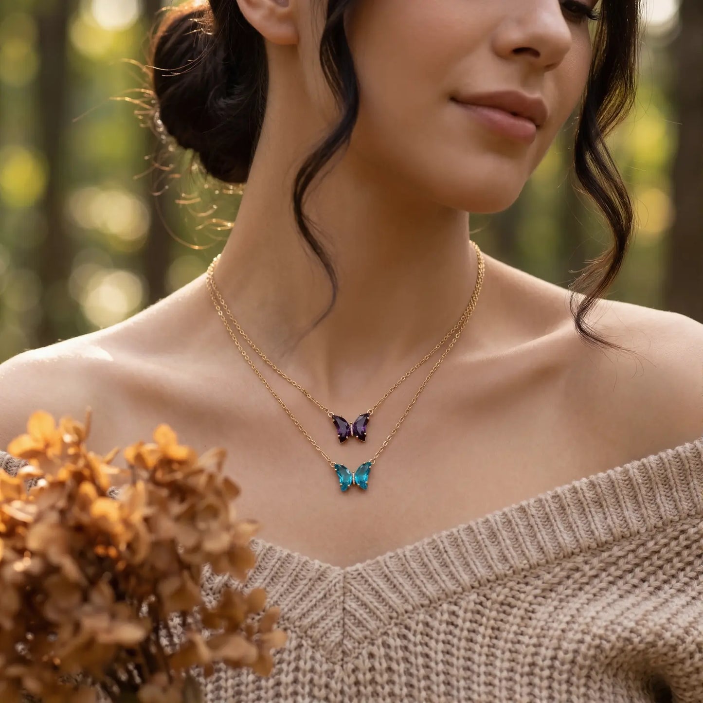 Iridescent Glass Butterfly Necklace worn at the neckline, lifestyle view 5.