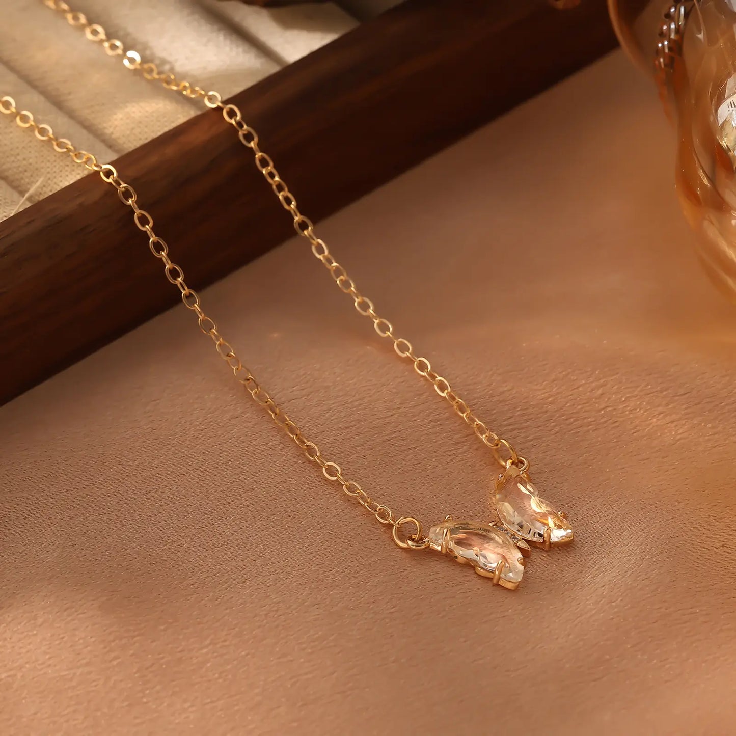 Iridescent Glass Butterfly Necklace, White color option.