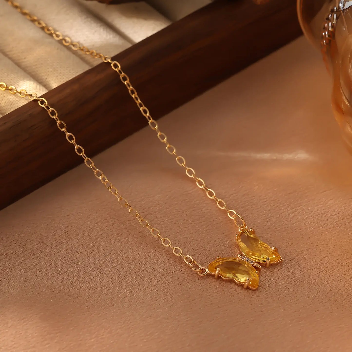 Iridescent Glass Butterfly Necklace, Yellow color option.