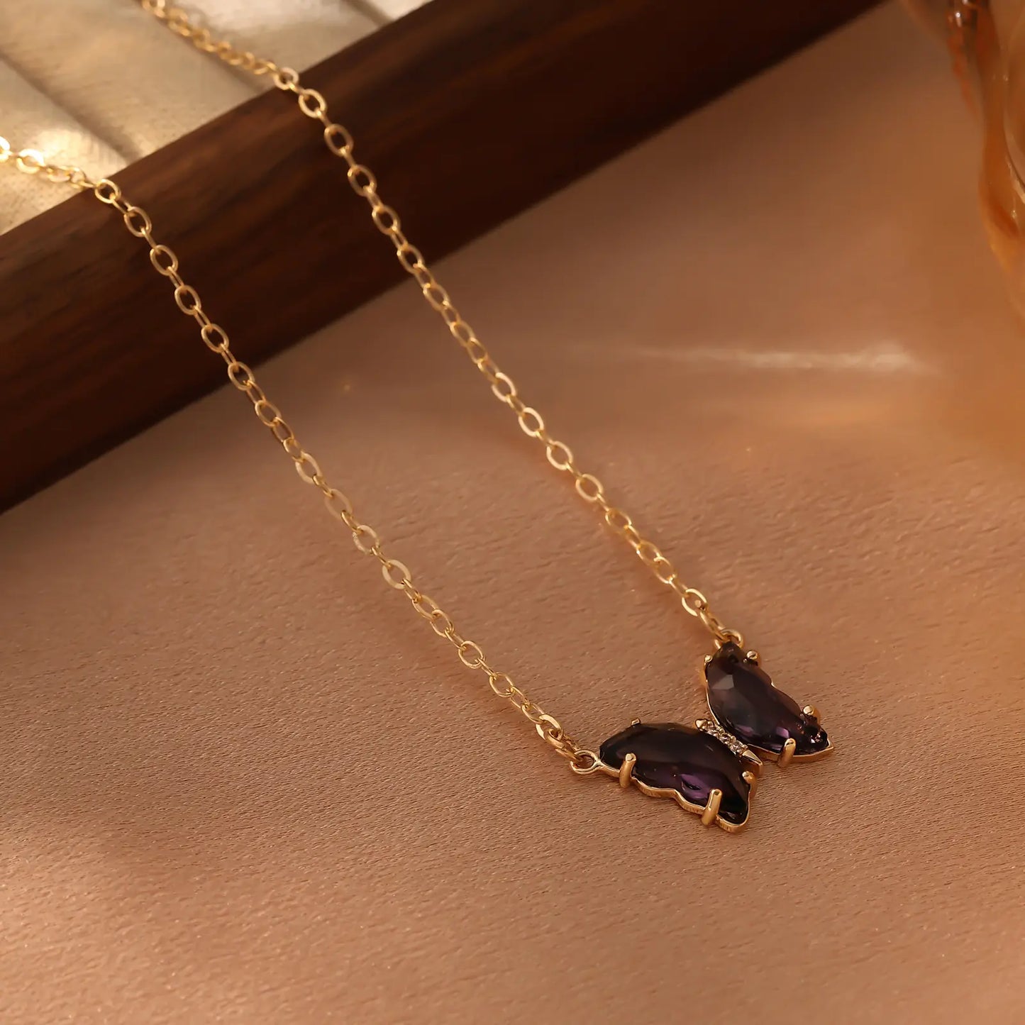 Iridescent Glass Butterfly Necklace, Black color option.