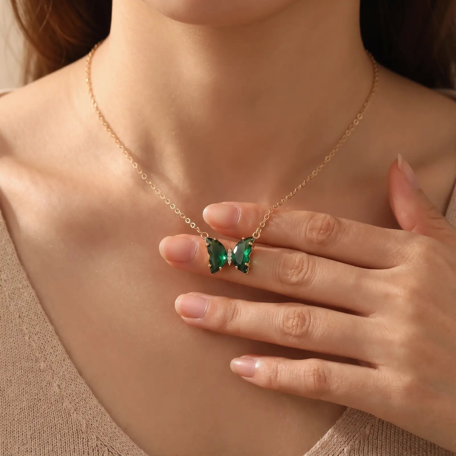 Iridescent Glass Butterfly Necklace worn at the neckline, lifestyle view 8.