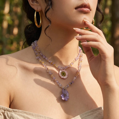 Resin Flower Crystal Necklace worn at the neckline, lifestyle view 1.