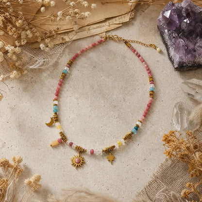 Rose Celestial necklace arranged with mineral and botanical accents