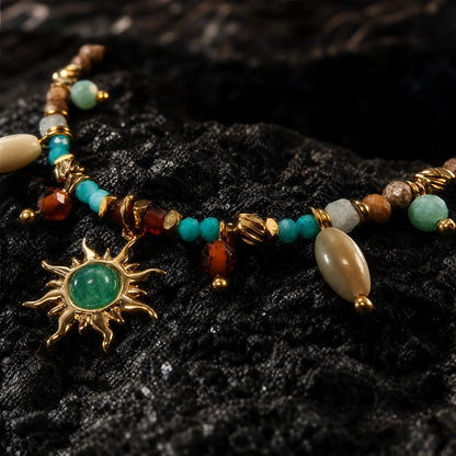 Amazonite beads shell accents and sun motif in close view